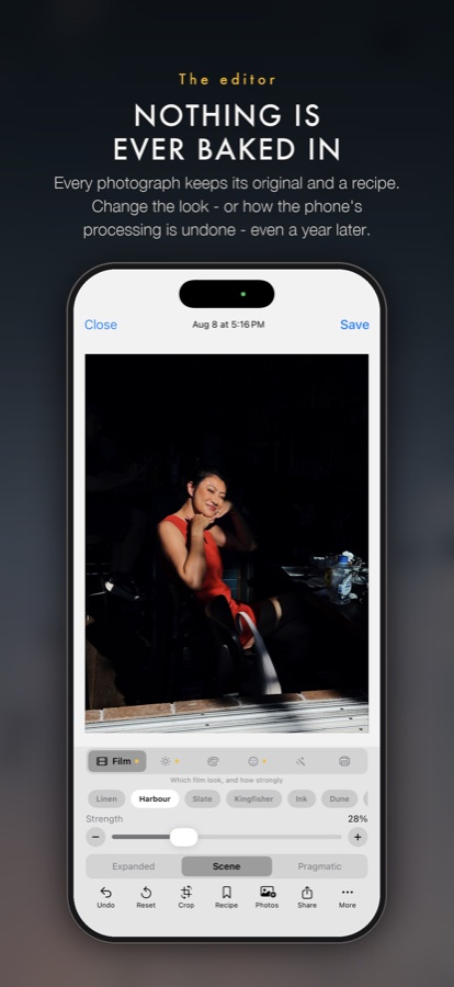 The editor with the film strip open over a photograph